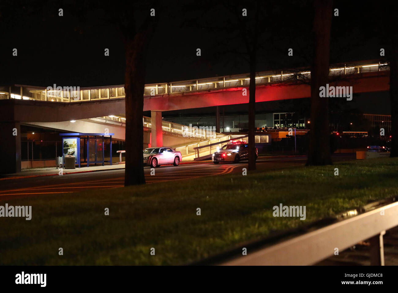 New York, USA. 14th Aug, 2016. A police car is seen at the JFK International Airport in New York, the United States, on Aug. 14, 2016. All the flights at the JFK International Airport in New York have been suspended due to reports of shooting inside a terminal, local media said on Sunday. Credit:  Tao Chen/Xinhua/Alamy Live News Stock Photo