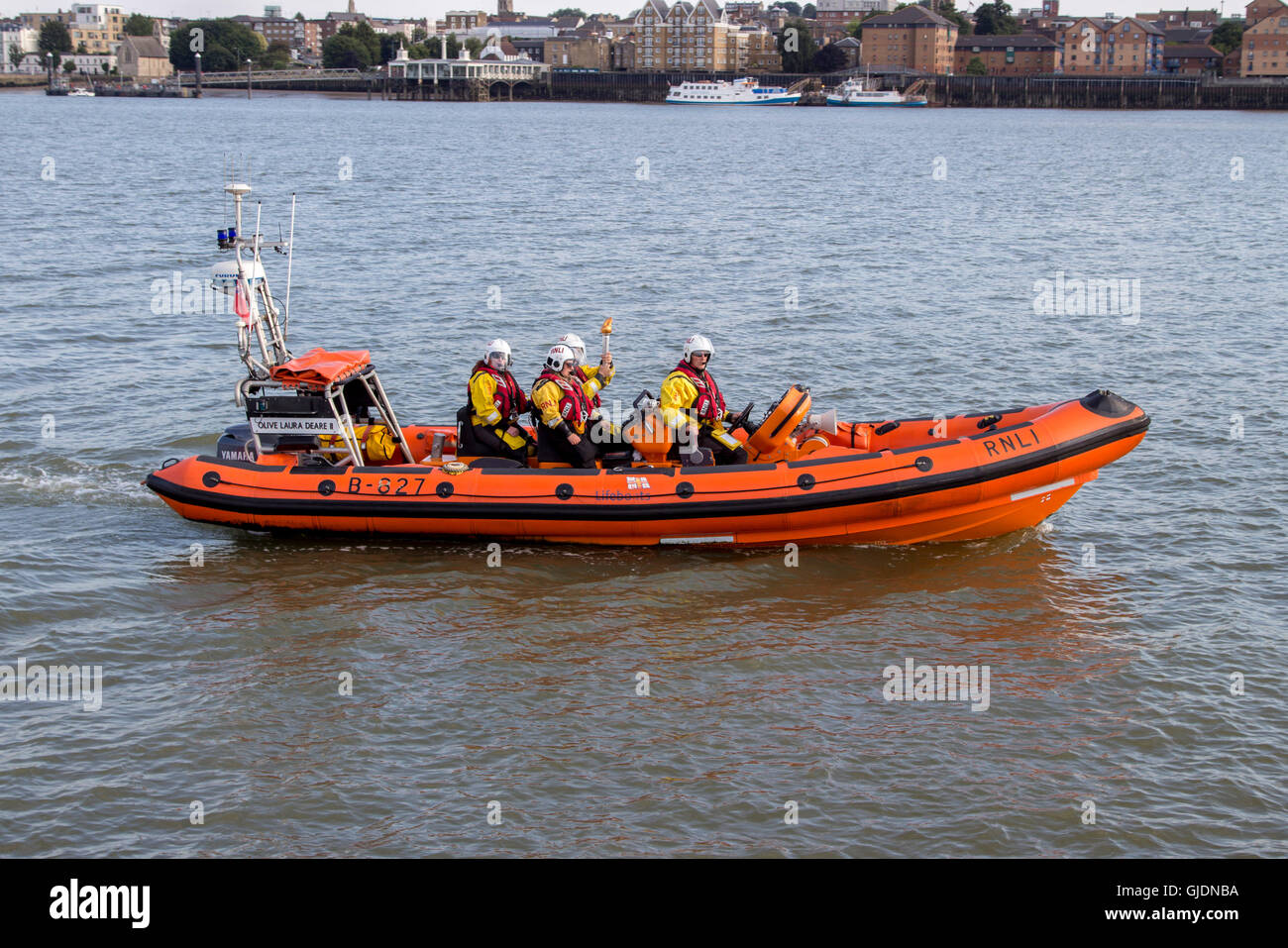 Essex-Uk - Royal Air Force Air Cadets celebrate 75th Anniversary with torch relay though Essex, UK. 14th Aug, 2016. The torch is handed over to the RNLI to take to kent wing across the themes. Credit:  darren Attersley/Alamy Live News Stock Photo