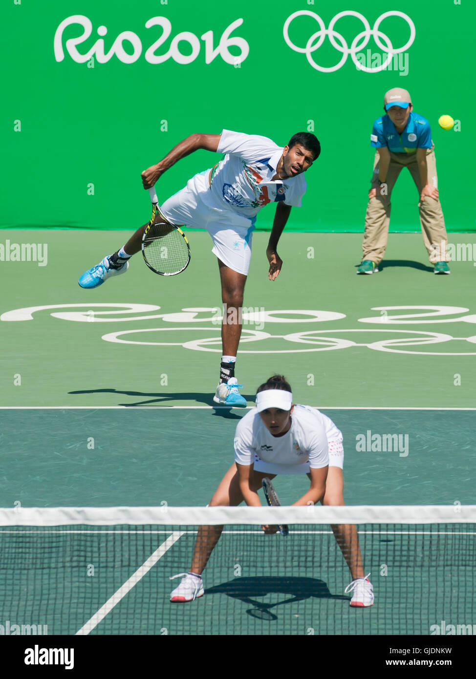 Rio De Janeiro, Brazil. 14th Aug, 2016. Sania Mirza (down) and Rohan Bopanna (up) of India in action during a mixed doubles match at the 2016 Summer Olympics in Rio de Janeiro, Brazil, August 14, 2016. © Vit Simanek/CTK Photo/Alamy Live News Stock Photo