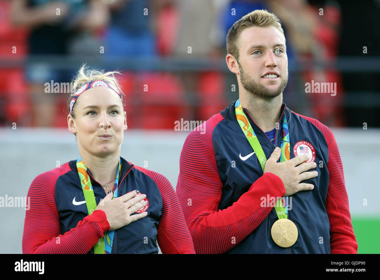 Rio de Janeiro, Brazil 14th Aug, 2016 Realisation sinking in for Bethanie Mattek-Sands and Jack Sock at winning the Gold Medal in the Olympics Mixed Doubles Tennis Final in Rio de Janeiro.They beat Venus Williams and Rajeev Ram. Stock Photo