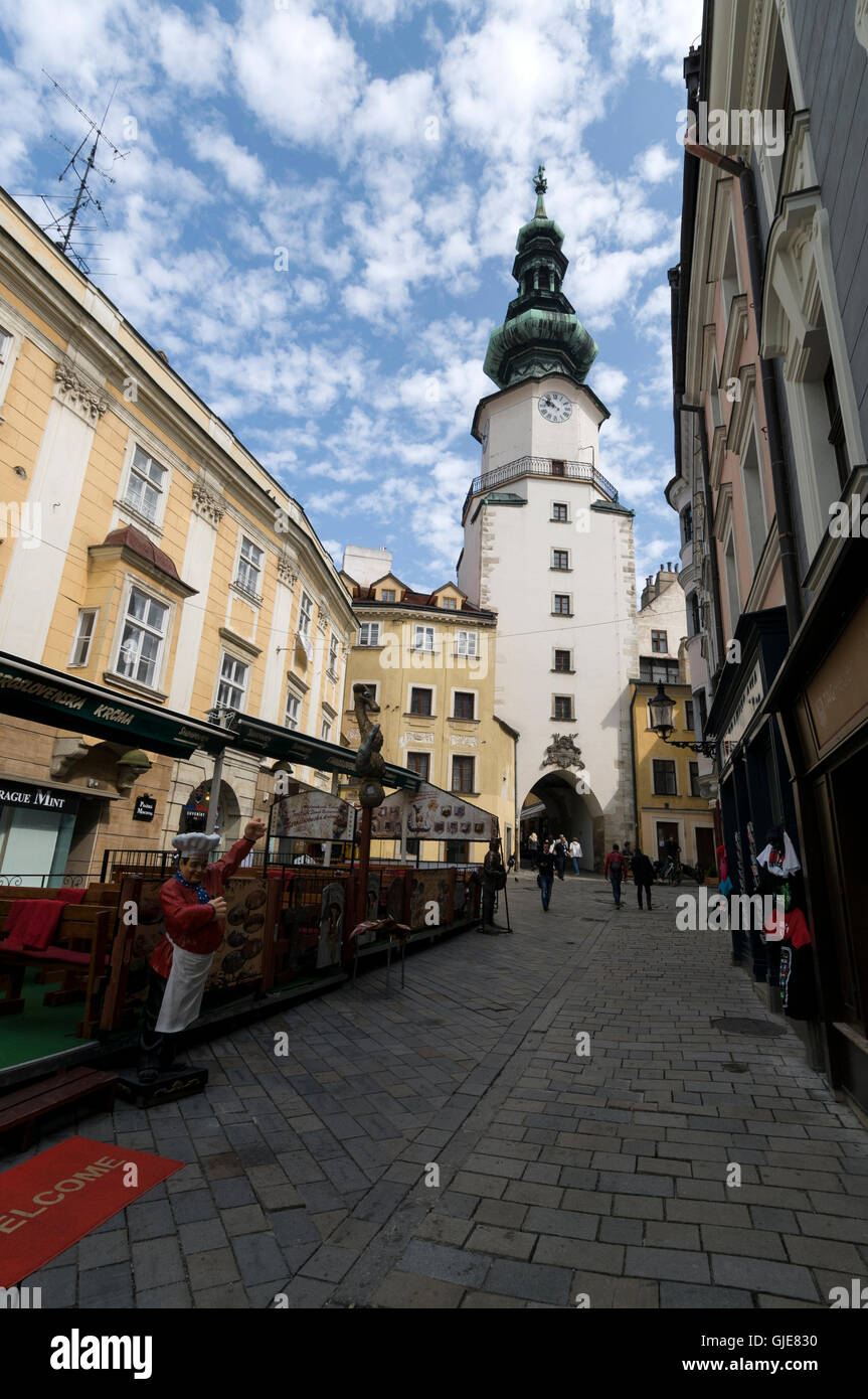Michalska ulica  ( Michalska Street )  lined with open-air restaurants and Saint Michael's Gate,  in Bratislava old town, Bratis Stock Photo