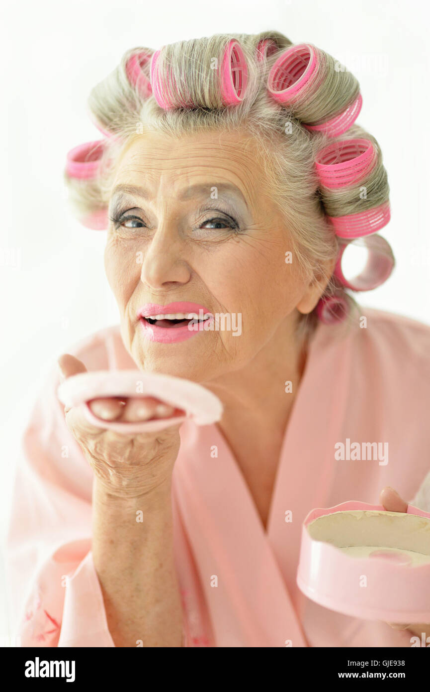 Senior woman in hair rollers Stock Photo Alamy