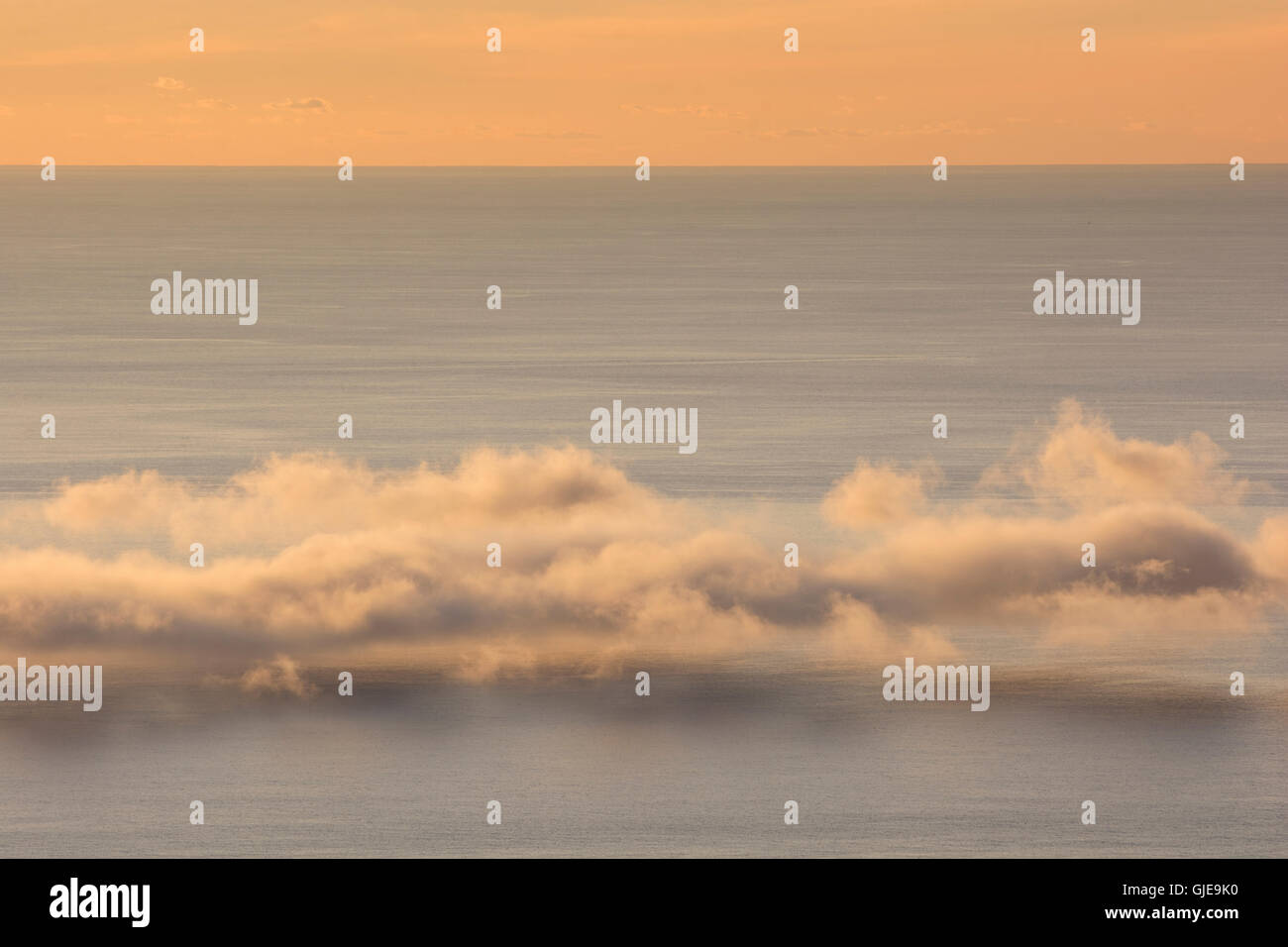 Atlantic Ocean. Cloud bank at sunrise. Acadia National Park, Maine, USA. Stock Photo