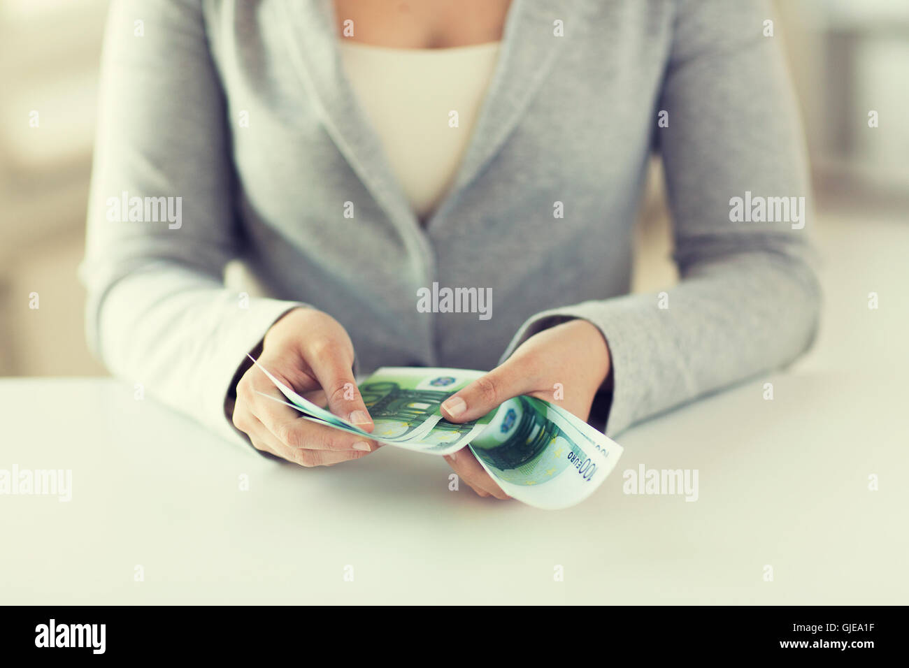 close up of woman hands counting euro money Stock Photo