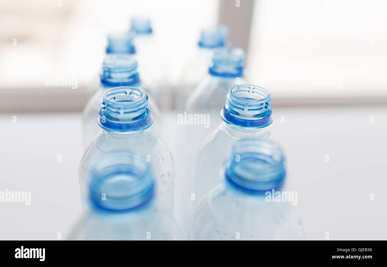 close up of empty used plastic bottles on table Stock Photo
