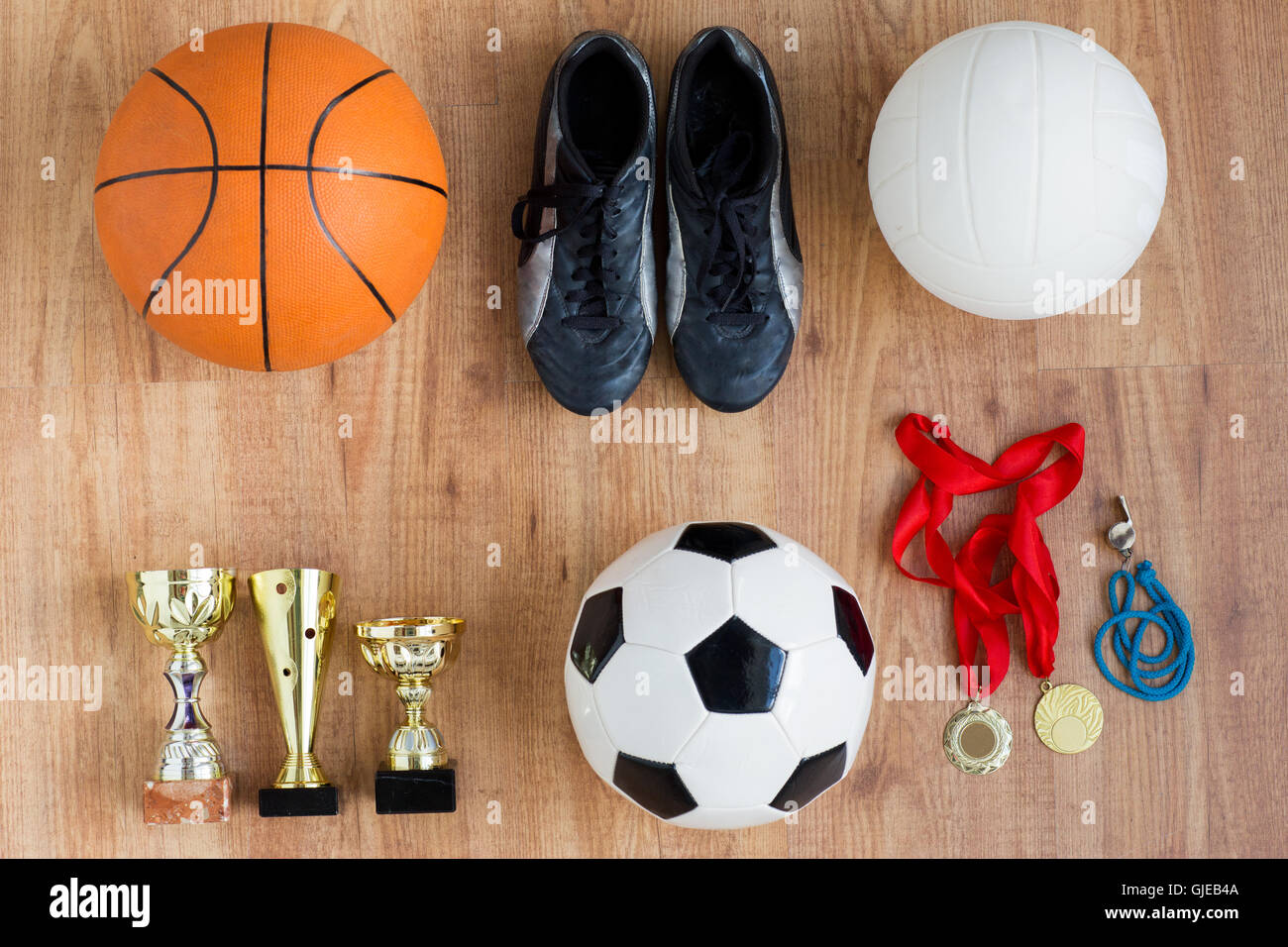 sports balls, boots, cups, whistle and medals Stock Photo