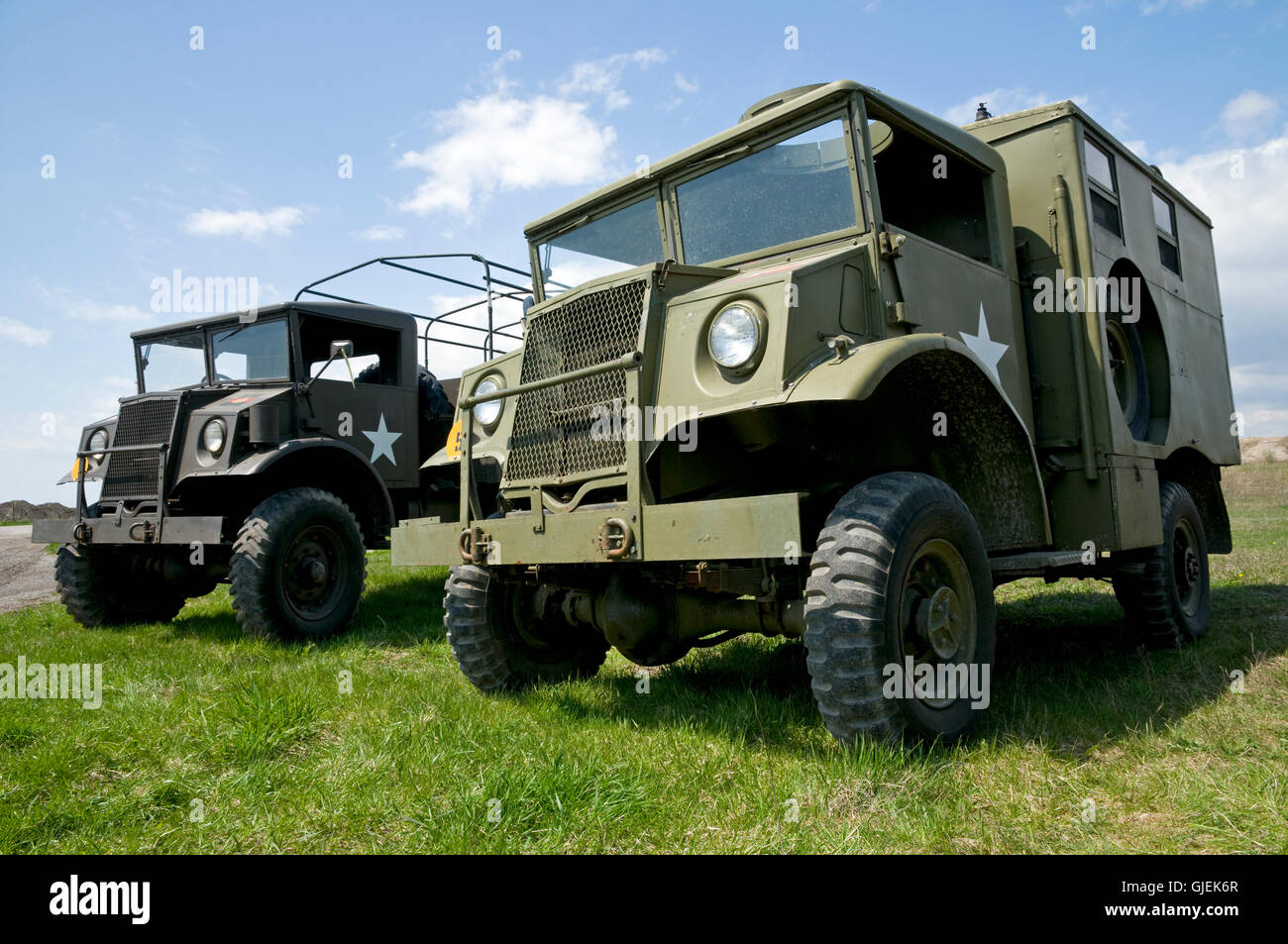 A pair of World War Two American trucks in early summer. Stock Photo