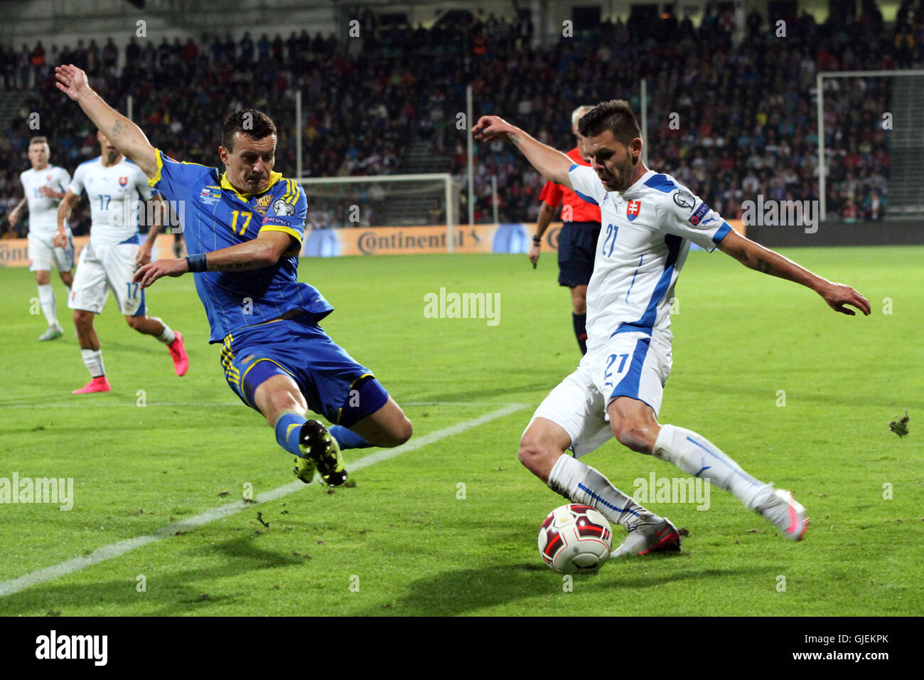 Artem Fedetskiy (17) and Michal Duris (21) in action during the EURO 2016 qualifier Slovakia vs Ukraine 0-0. Stock Photo