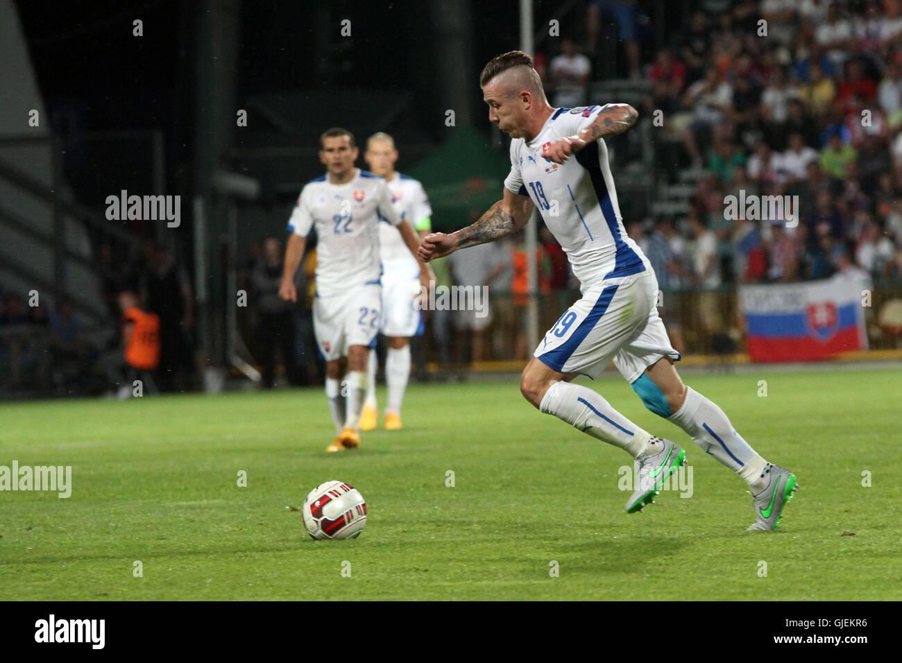 Juraj Kucka (R) in action during the EURO 2016 qualifier Slovakia vs Macedonia 2-1. Stock Photo