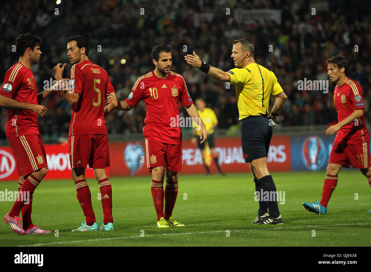 Referee Bjorn Kuipers giving instructions to Spanish players during EURO 2016 qualifier Slovakia vs Spain 2-1. Stock Photo