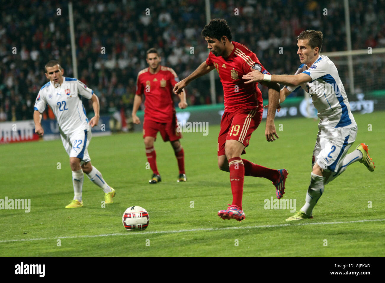 Diego Costa (19) and Peter Pekarik (2) in action during EURO 2016 qualifier Slovakia vs Spain 2-1. Stock Photo