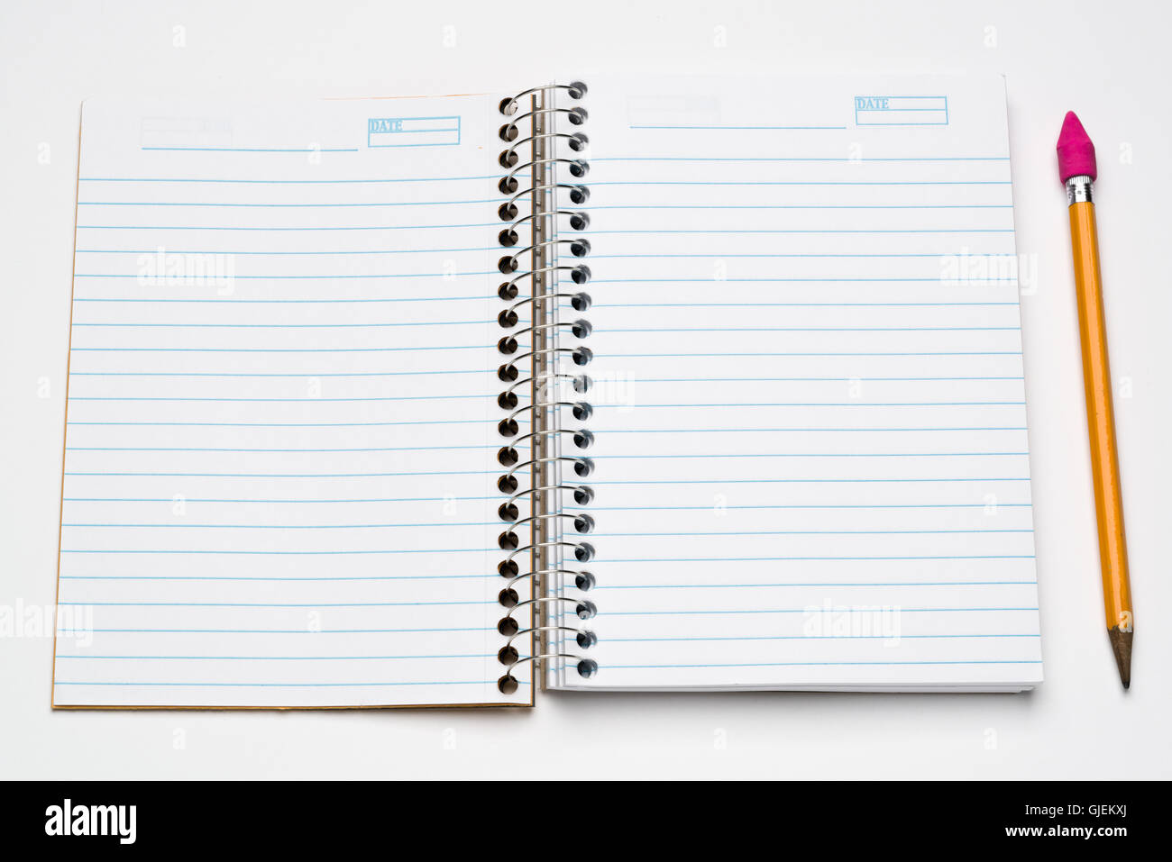 Pocket size spiral notebook on a  white background Stock Photo