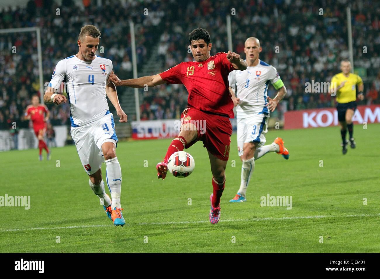 Jan Durica (4) and Diego Costa (19) during EURO 2016 qualifier Slovakia vs Spain 2-1. Stock Photo