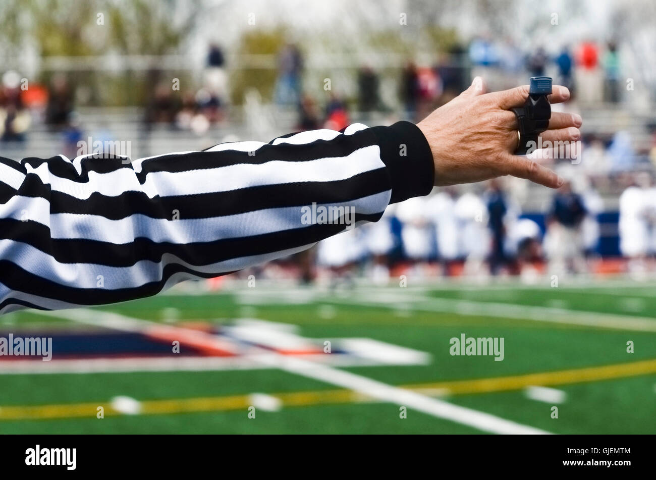 Referee signals play Stock Photo