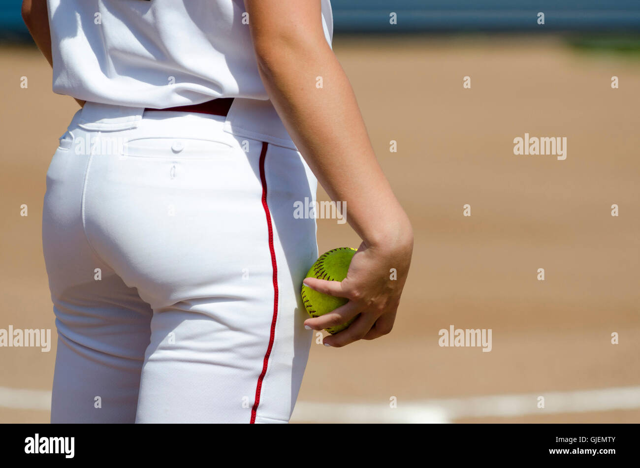 Softball player holding ball Stock Photo Alamy