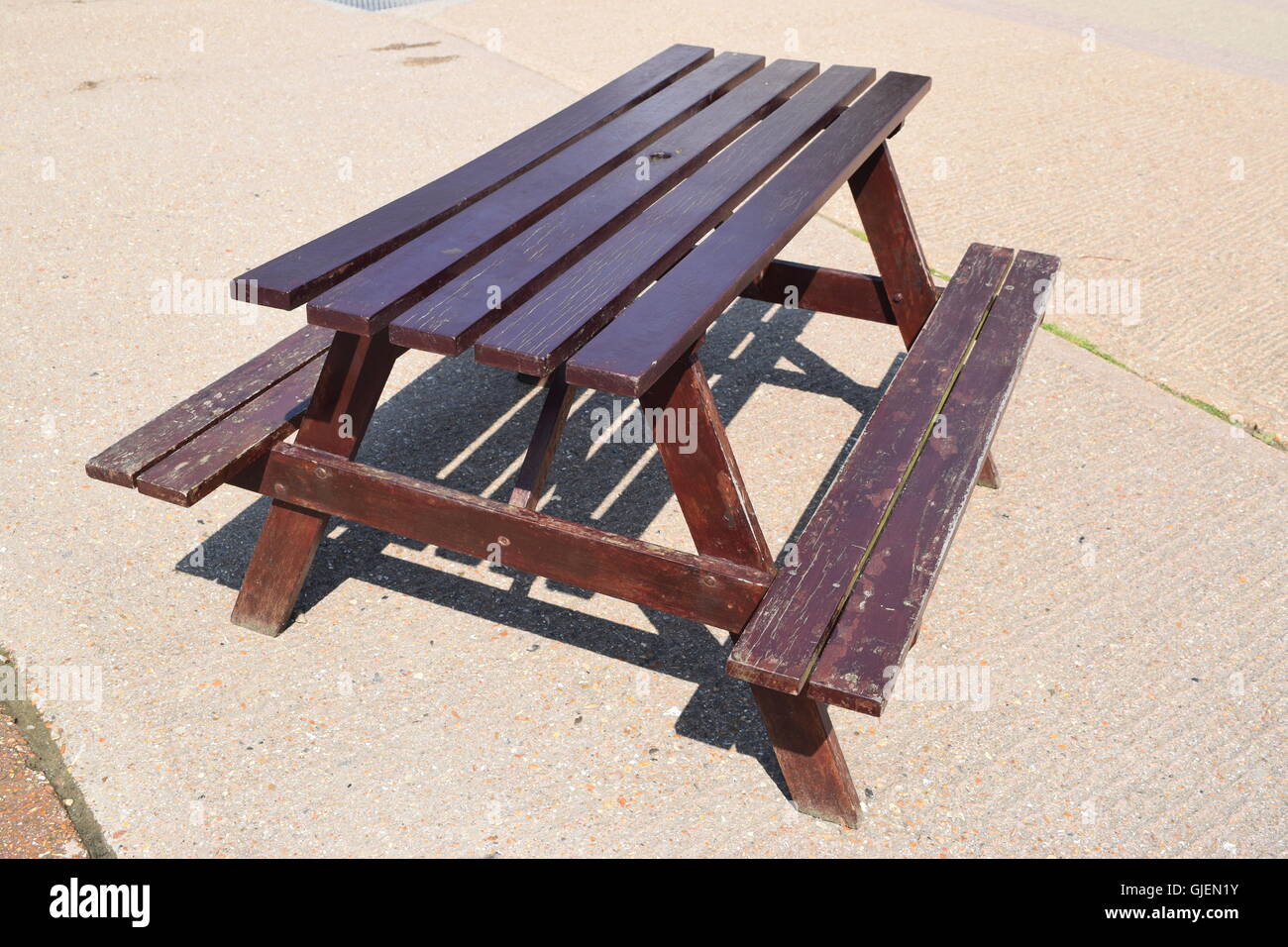 Brown Picnic Table on the Pavement Stock Photo Alamy