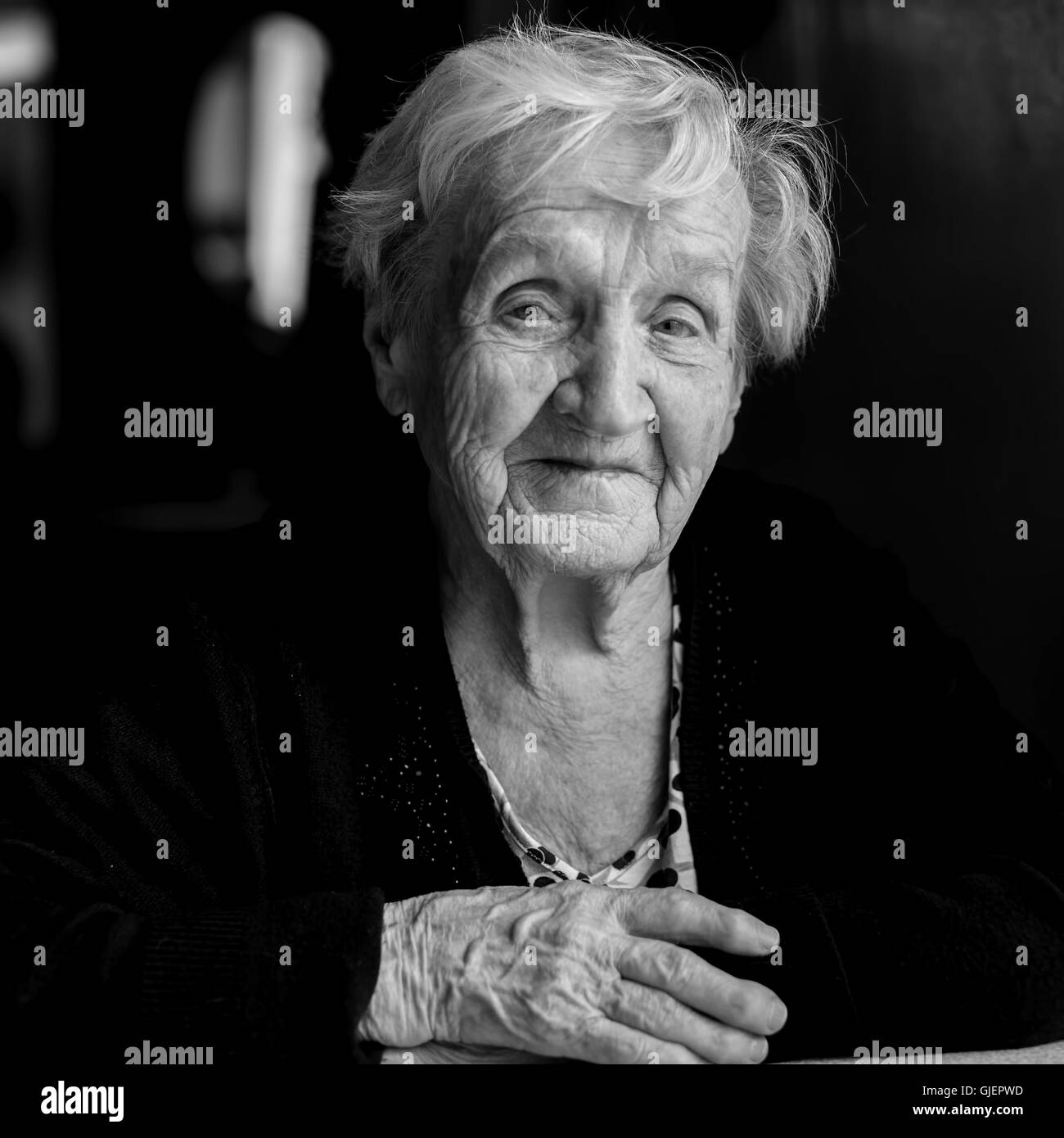 Black and white portrait of an elderly woman. Stock Photo