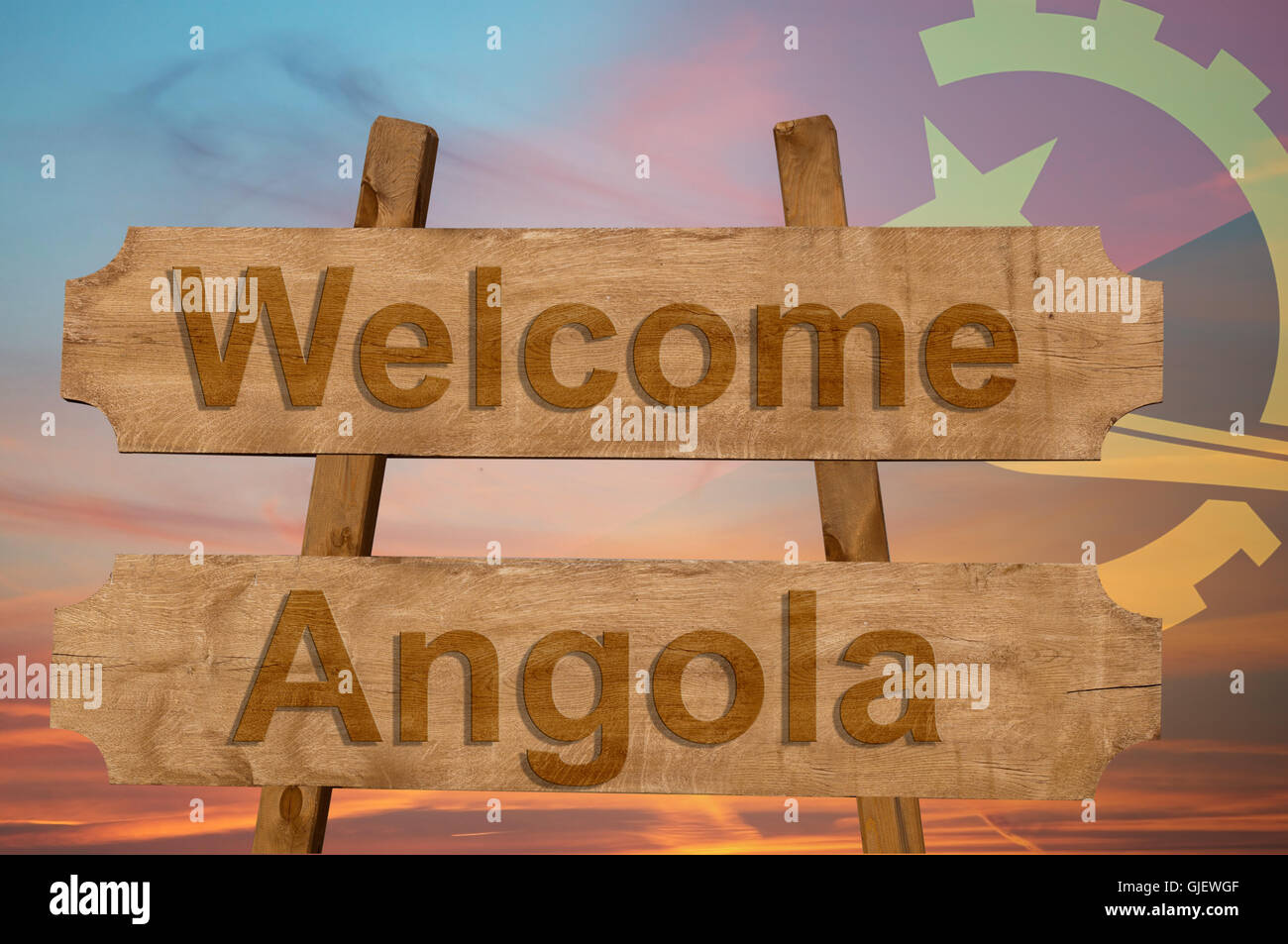 to Angola sing on wood background with blending national flag