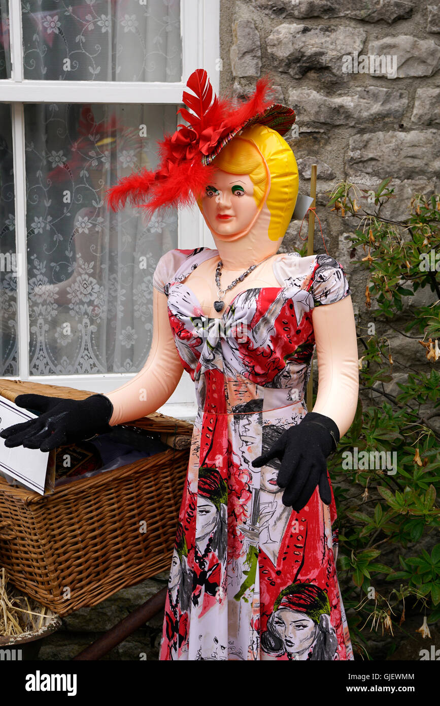 Inflatable Doll dressed in clothing in Tideswell Peak district Derbyshire Stock Photo