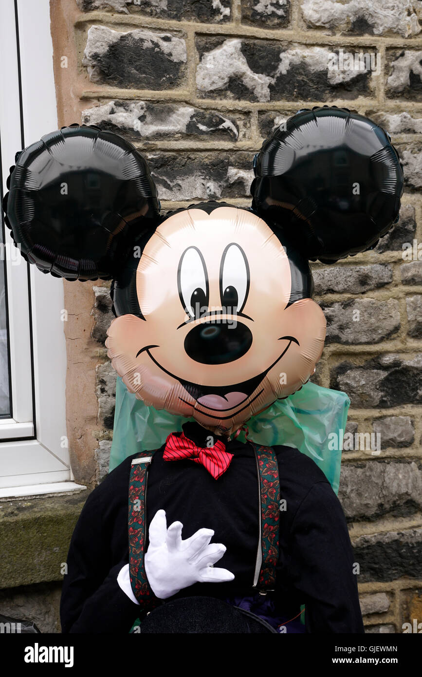 Mickey Mouse Doll dressed in clothing in Tideswell Peak district Derbyshire Stock Photo