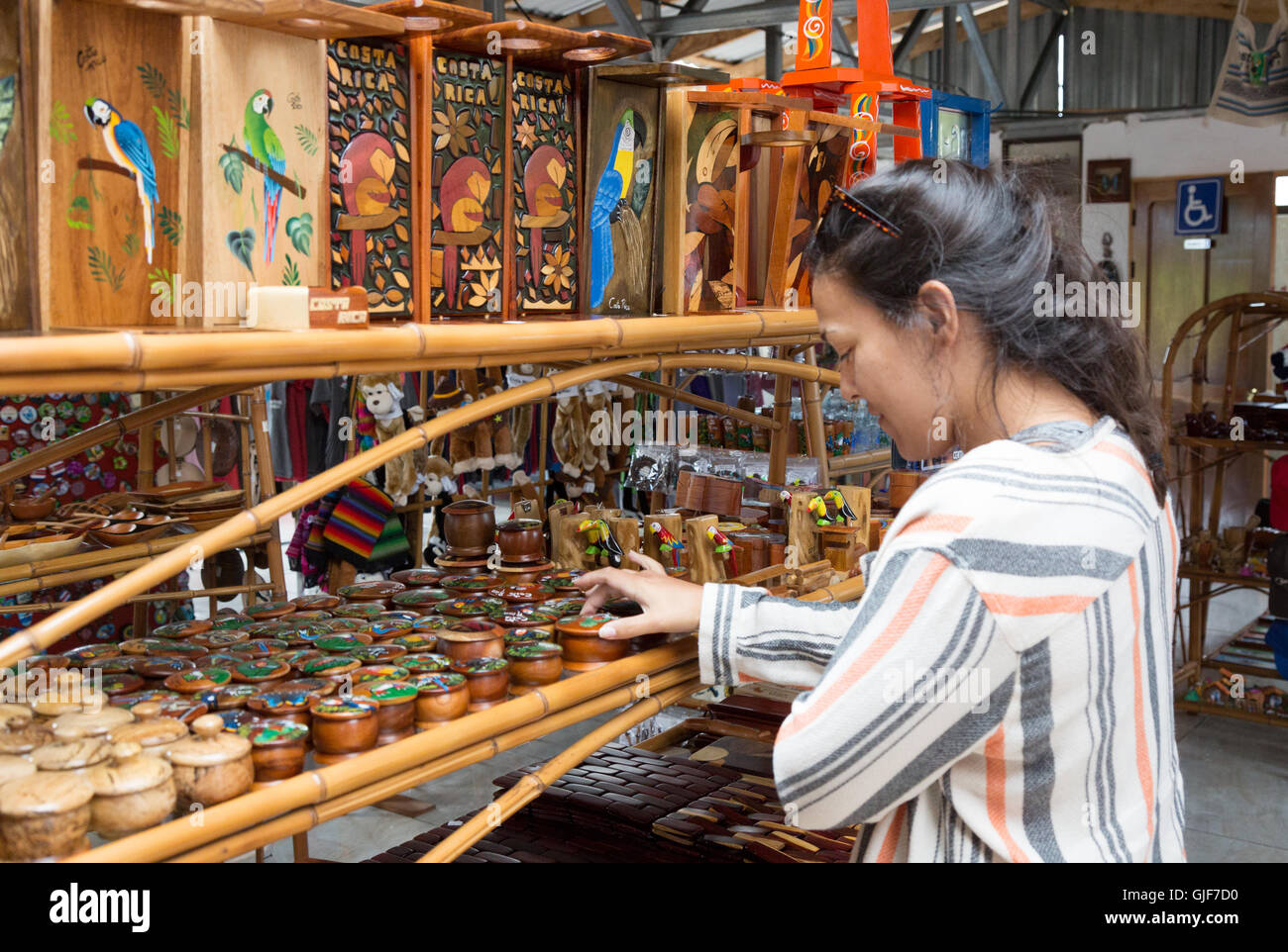 Female tourist shopping for gifts in a store, La Fortuna, Costa Rica