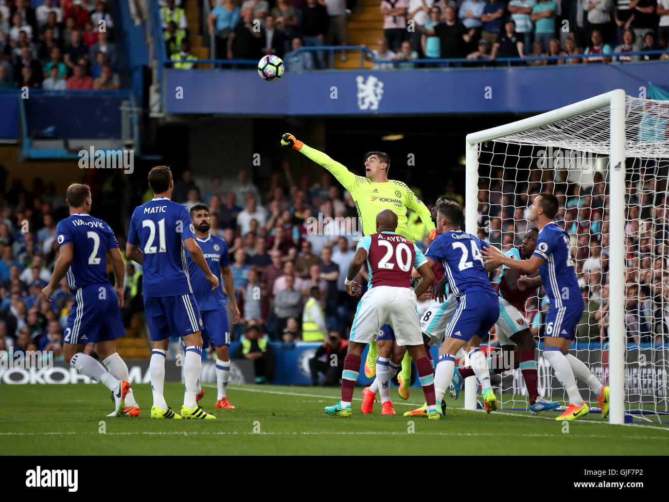 Chelsea goalkeeper thibaut courtois punches ball clear hires stock
