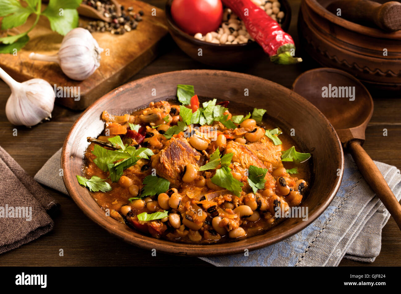 Baked beans with pork and spoon Stock Photo Alamy