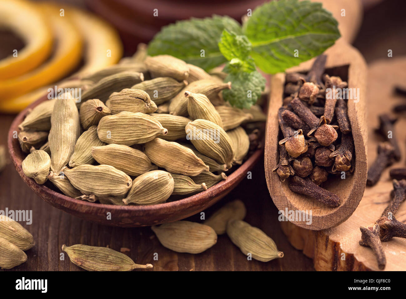 Cardamom and clove seasoning closeup Stock Photo