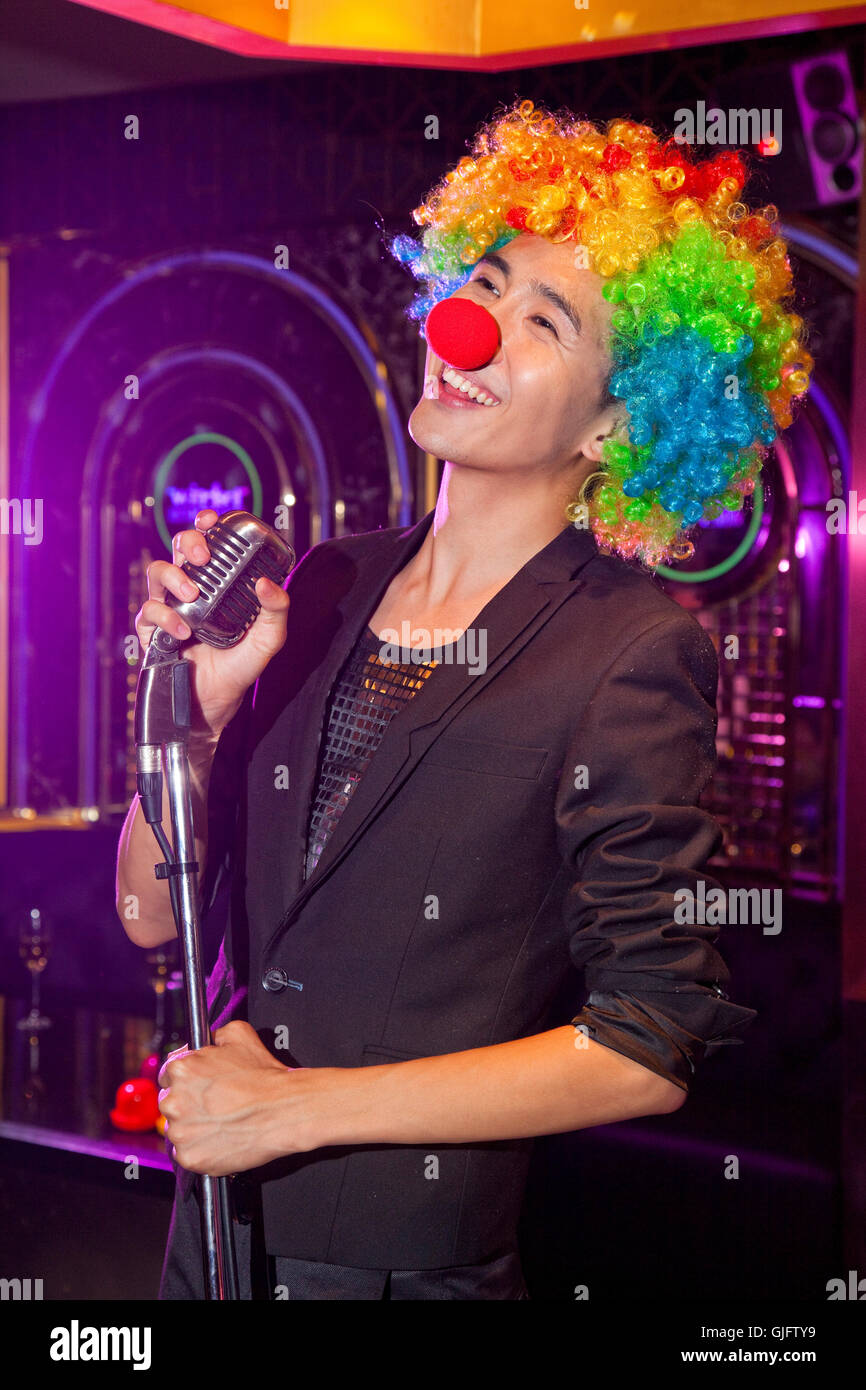 Young men in KTV carnival Stock Photo - Alamy