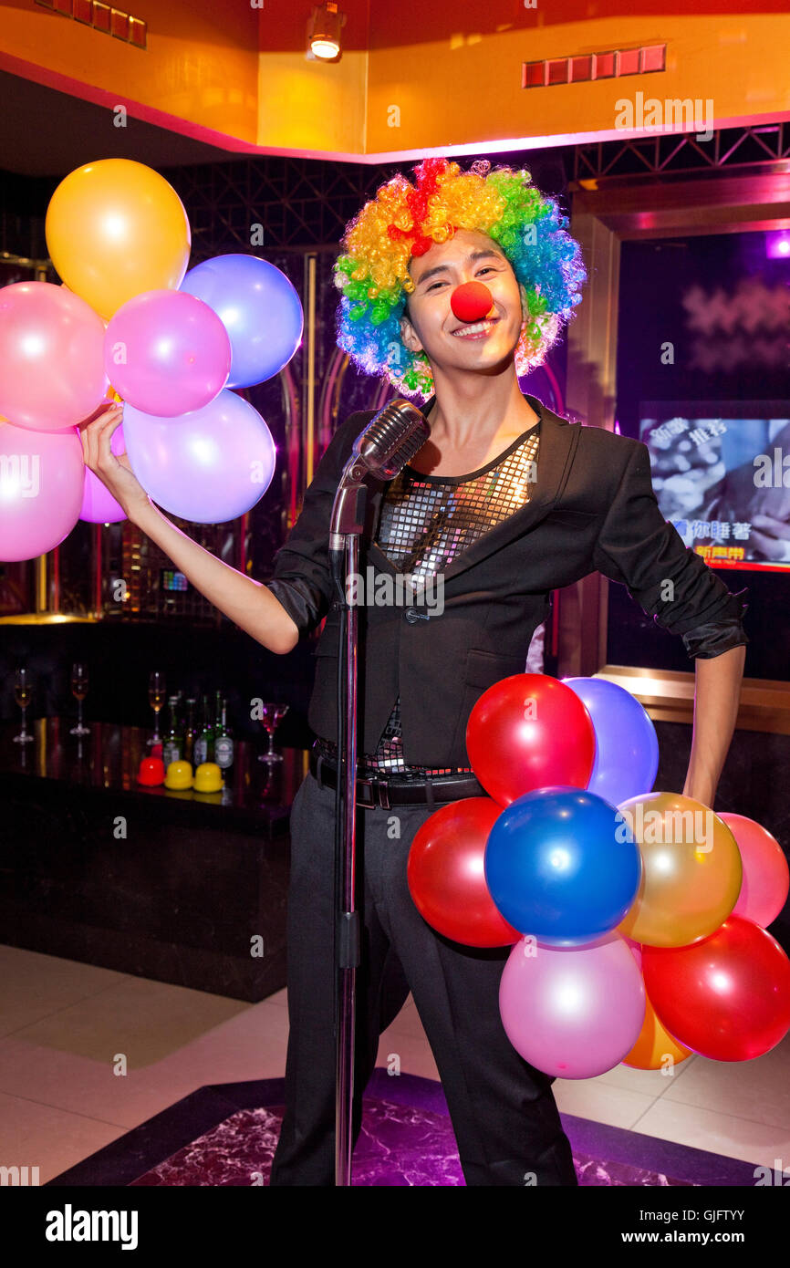 Young men in KTV carnival Stock Photo - Alamy