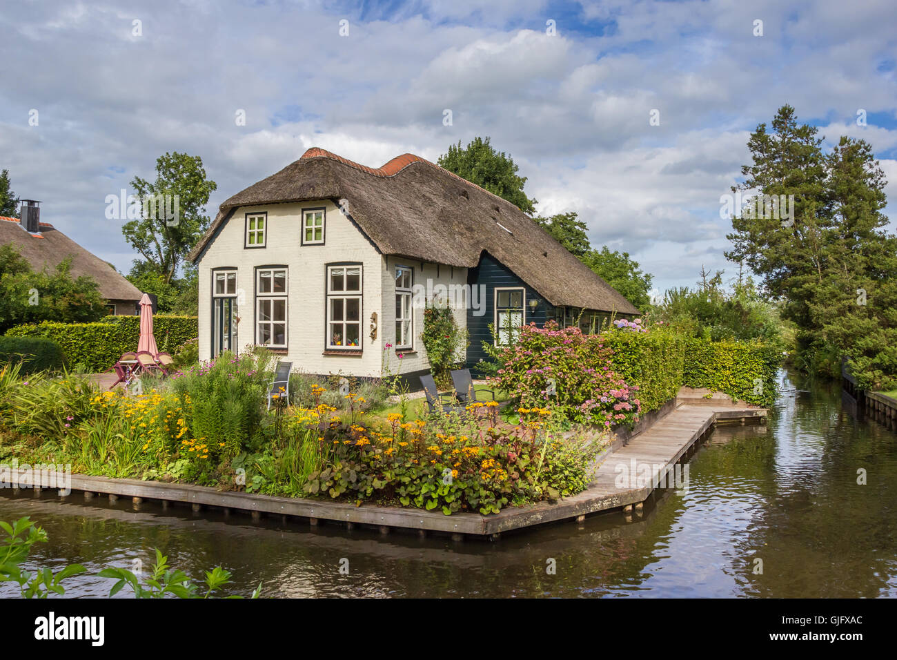 White farm house with thatched roof in Giethoorn, Netherlands Stock