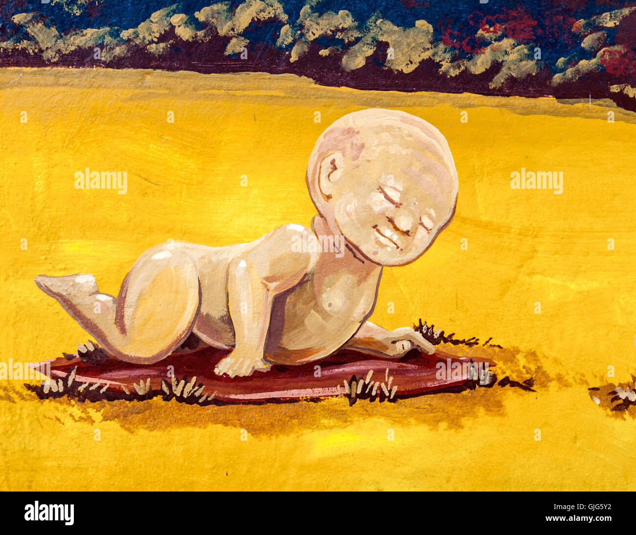 Detail of graffiti mural on the Berlin wall showing a baby, East Side Gallery, Friedrichshain, Berlin, Germany. Stock Photo