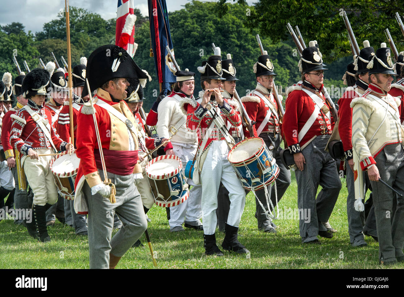 Coldstream Regiment of Foot Guards on the battlefield of a Napoleonic war reenactment at Spetchley Park, Worcestershire, England Stock Photo