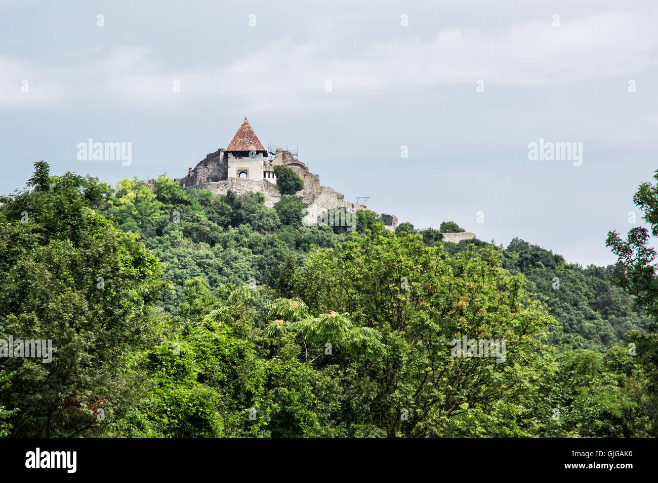 Ruin castle of Visegrad, Hungary. Ancient architecture and greenery. Travel destination. Cultural heritage. Stock Photo
