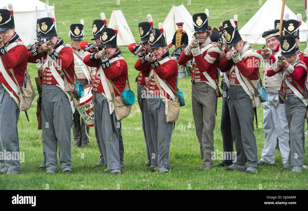 Coldstream Regiment of Foot Guards on the battlefield of a Napoleonic war reenactment at Spetchley Park, Worcestershire, England Stock Photo