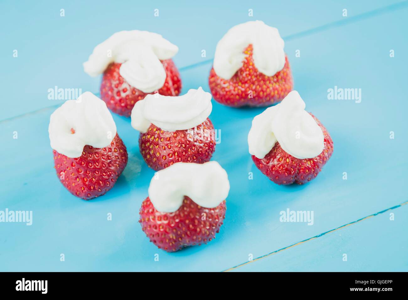 Fresh strawberries and whipped cream Stock Photo
