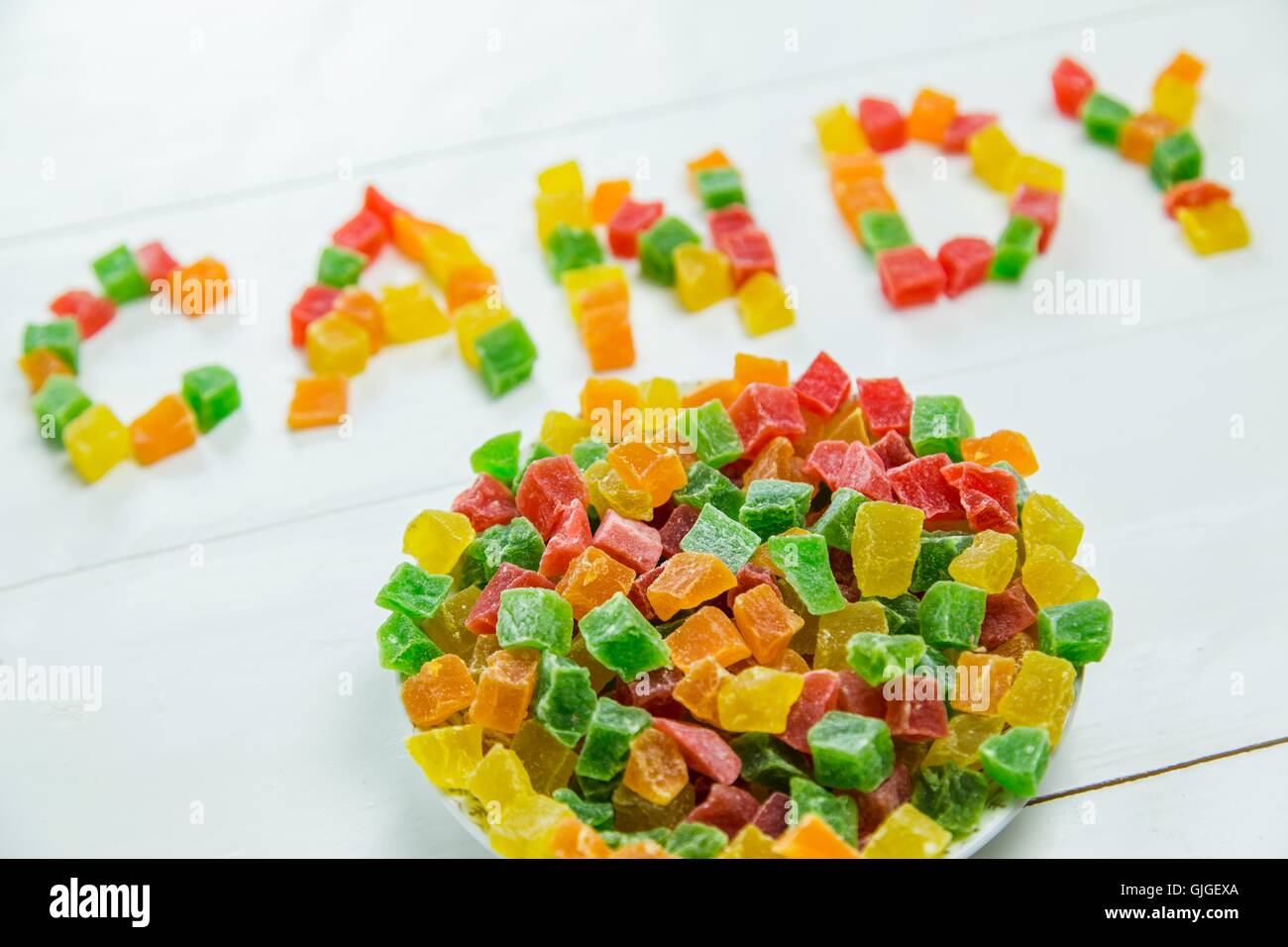 Sweet word with candied fruits Stock Photo Alamy