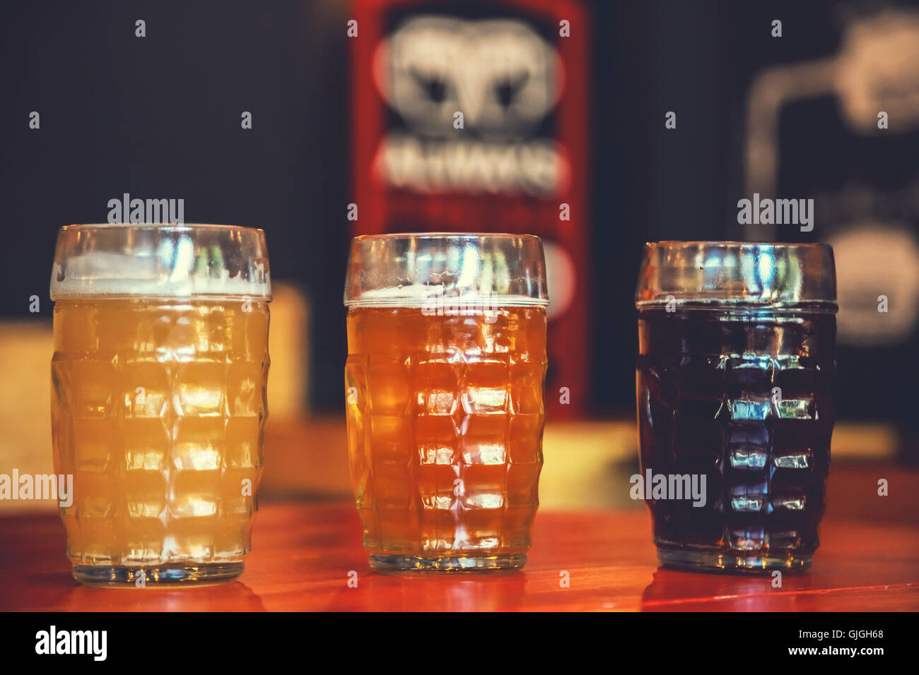 A pint glass of Peroni beer on a bar in a pub Stock Photo - Alamy