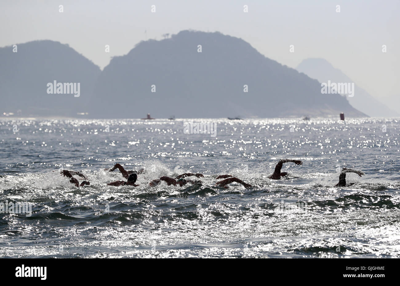 A view of competitors during the mens 10km marathon swimming at Fort Copacabana on the eleventh day of the Rio Olympic Games, Brazil. Stock Photo