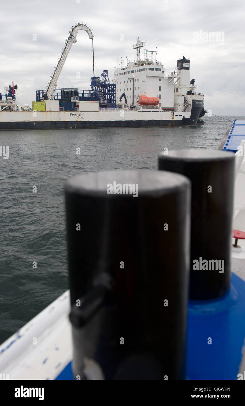 The special ship 'Cable Enterprise' laying a 25 kilometer long cable ...