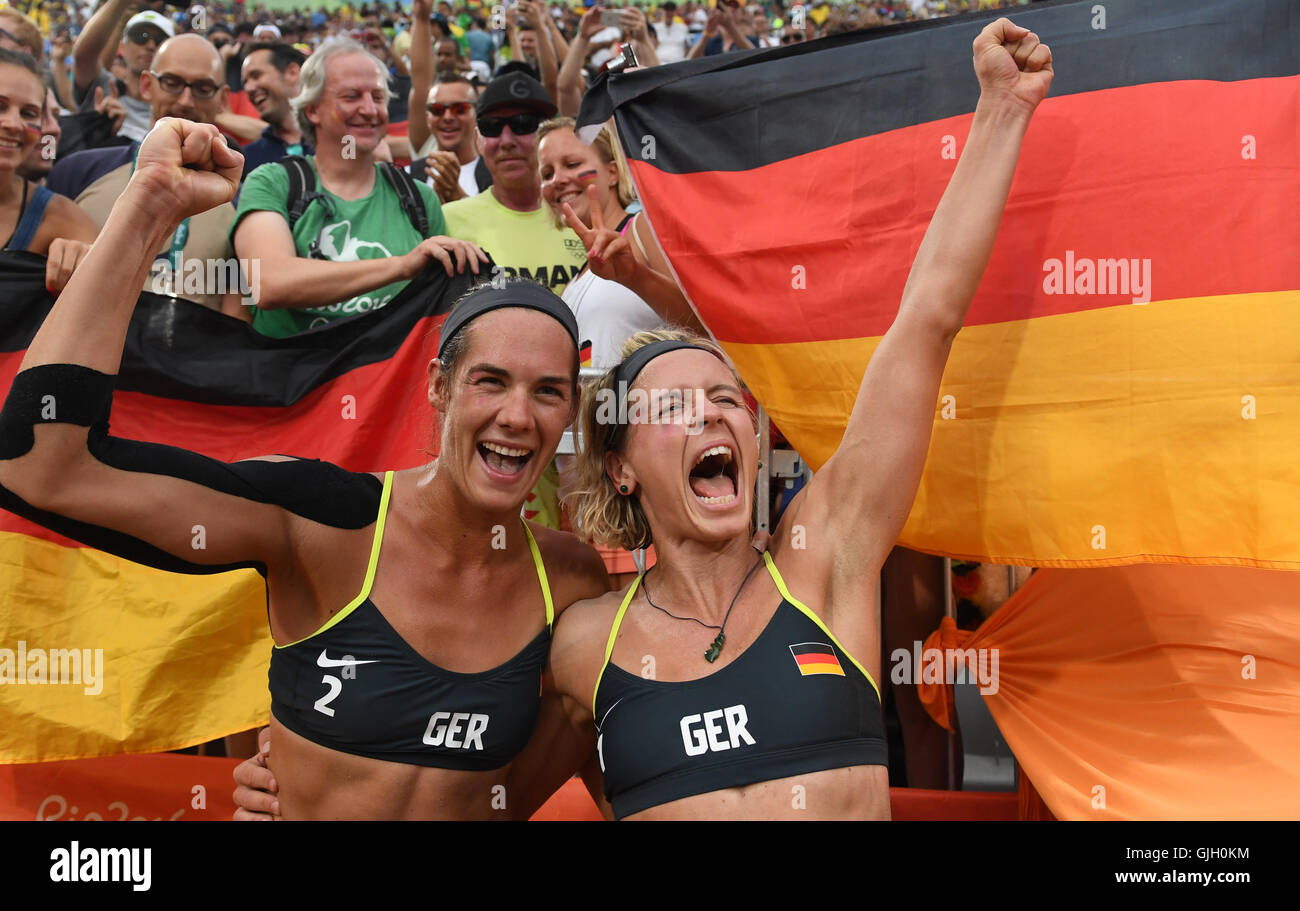 Rio de Janeiro, Brazil. 16th Aug, 2016. Kira Walkenhorst (L) and Laura  Ludwig (R) of Germany celebrate after the Women's Beach Volleyball  Semifinal between Rocha/Maestrini of Brazil and Ludwig/Walkenhorst of  Germany at