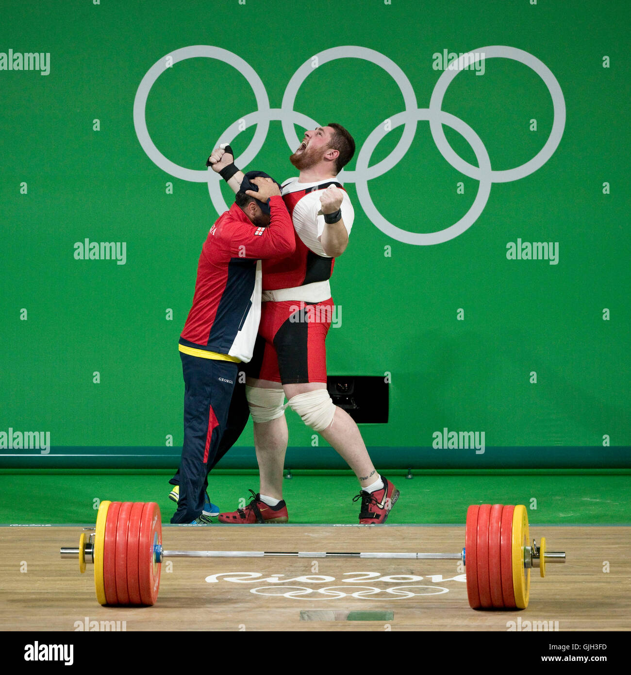 Rio de Janeiro, Brazil. 16th Aug, 2016. LASHA TALAKHADZE of Georgia celebrates after setting a world record for total weight lifted (473kg), winning gold in the men's  105kg weightlifting final at the Rio 2016 Summer Olympic Games. Credit:  Paul Kitagaki Jr./ZUMA Wire/Alamy Live News Stock Photo