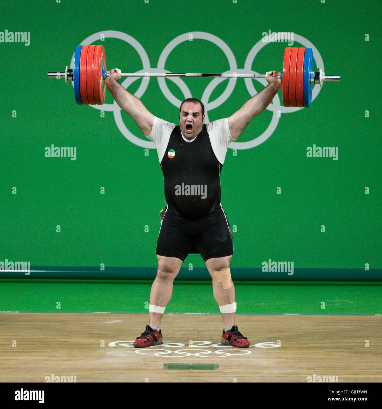 Rio de Janeiro, Brazil. 16th Aug, 2016. Gold medal favorite BEHDAD SALIMI of Iran sets a world record with a 216kg snatch during the men's  105kg weightlifting final at the Rio 2016 Summer Olympic Games. He later bombed out in the clean and jerk. Credit:  Paul Kitagaki Jr./ZUMA Wire/Alamy Live News Stock Photo
