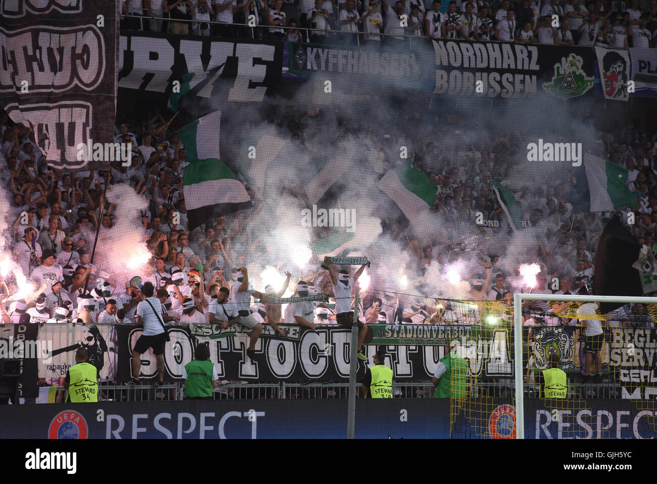 Moenchengladbach's fans displays pyrotechnics at UEFA Champions League  playoff first leg match between Switzerland's BSC Young Boys and Germany's  Borussia Moenchengladbach at the Stade de Suisse stadium in Bern,  Switzerland, on Tuesday,