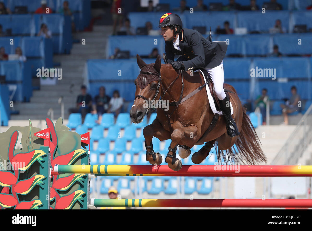 Rio de Janeiro, Brazil. 17th Aug, 2016. Manuel Fernandez Saro of Spain riding U WATCH during the Equestrian Jumping events during the Rio 2016 Olympic Games at Olympic Equestrian Centre Deodoro in Rio de Janeiro, Brazil, 17 August 2016. Photo: Friso Gentsch/dpa/Alamy Live News Stock Photo