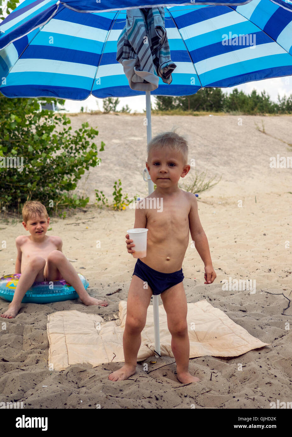 Two boys on beach Stock Photo