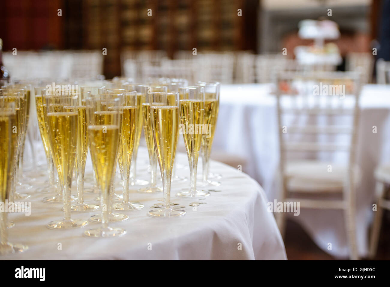 Close Up Of Champagne Glasses At Wedding Reception Stock Photo