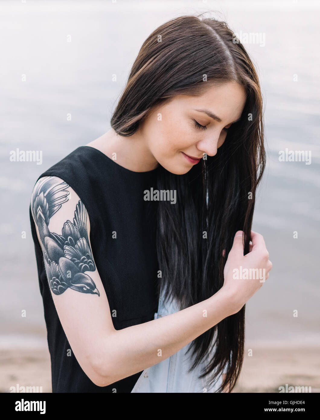 Long hair woman side view hi-res stock photography and images - Alamy