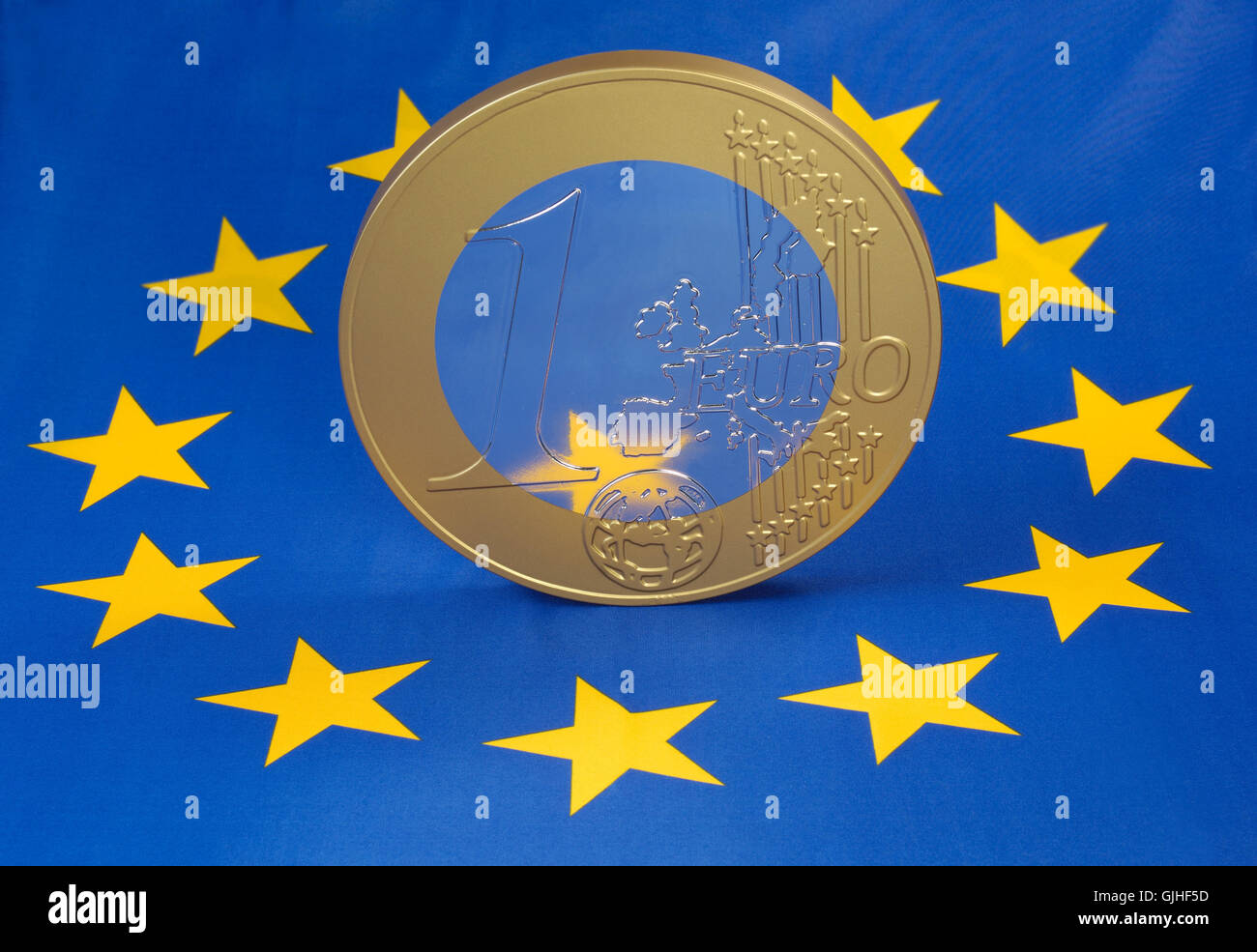 euro coin on the european flag Stock Photo