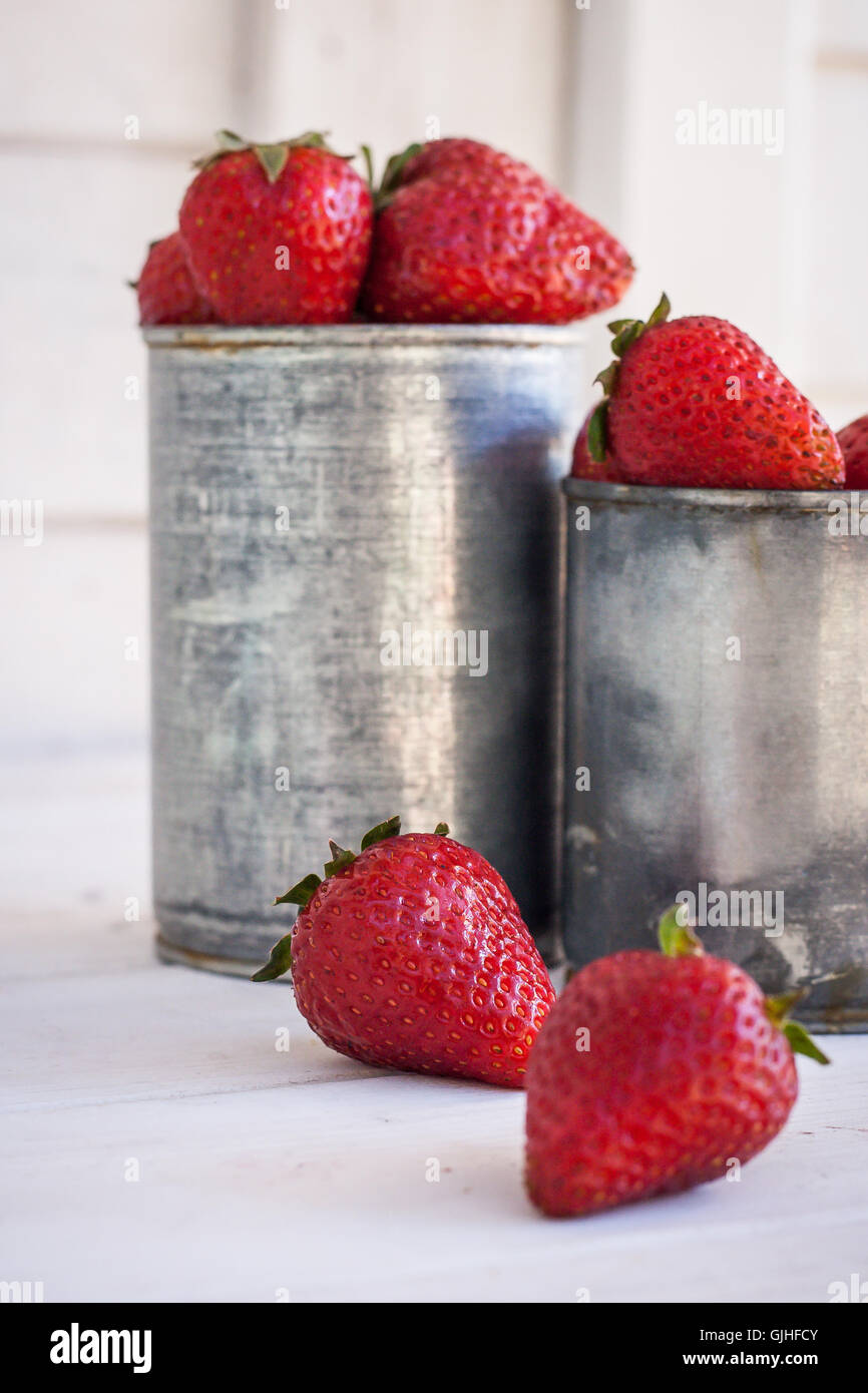 Strawberries in metal containers Stock Photo Alamy